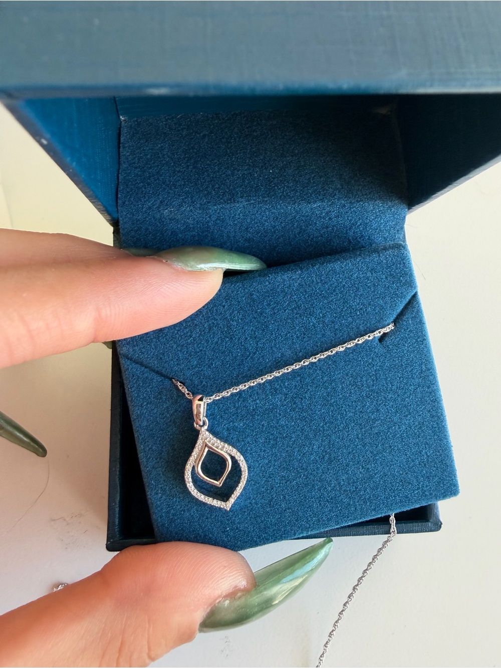 0.05 CT. T.W. Diamond necklace